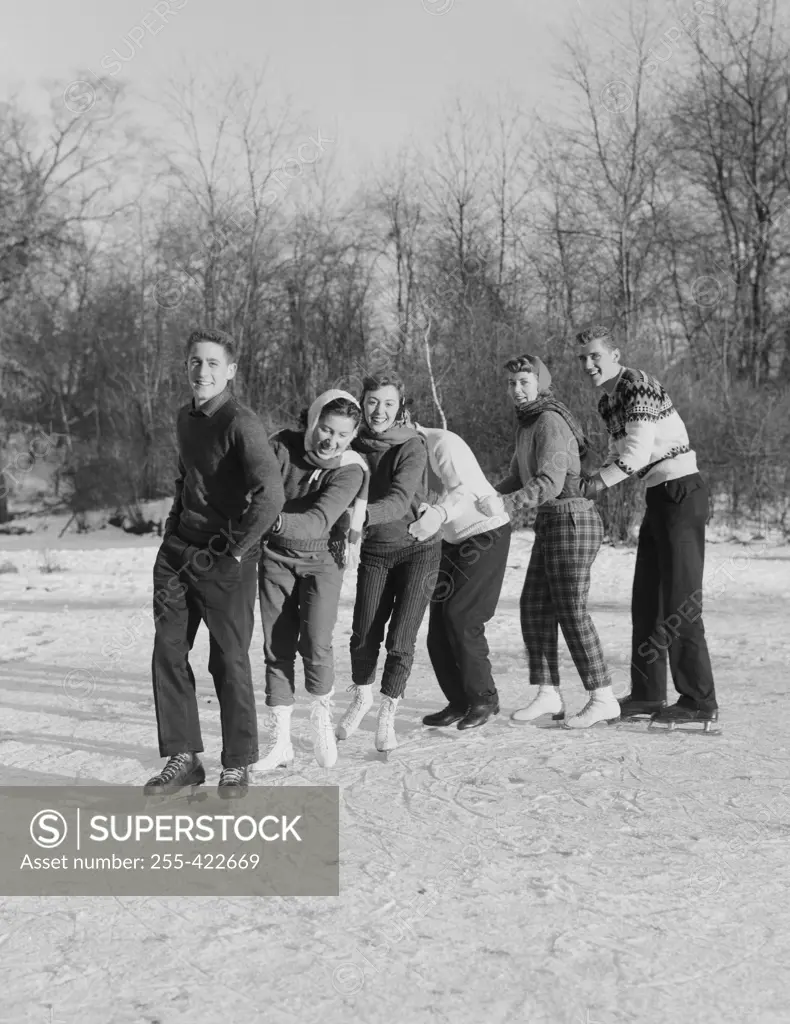 Group of friends ice-skating