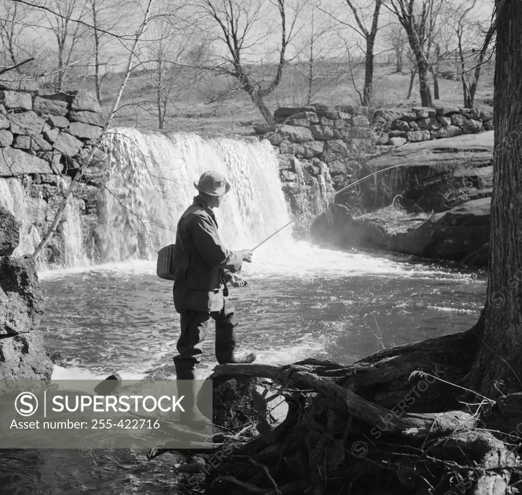 Man fishing in river