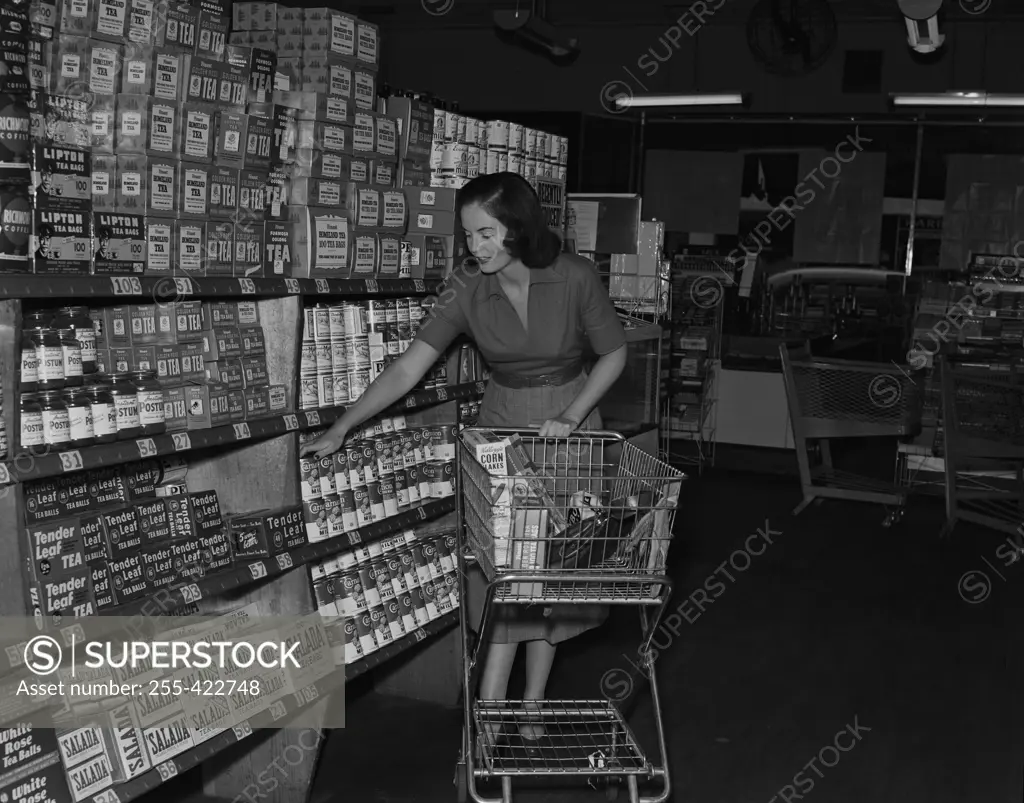 Young woman shopping in supermarket