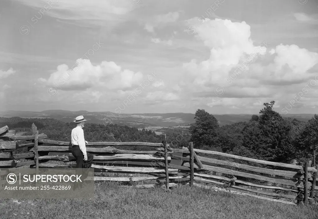 Farmer at rail fence.  Scene looking east from Laural Mountain, on U.S. Route 50 (Old North Western Pike). West Virginia