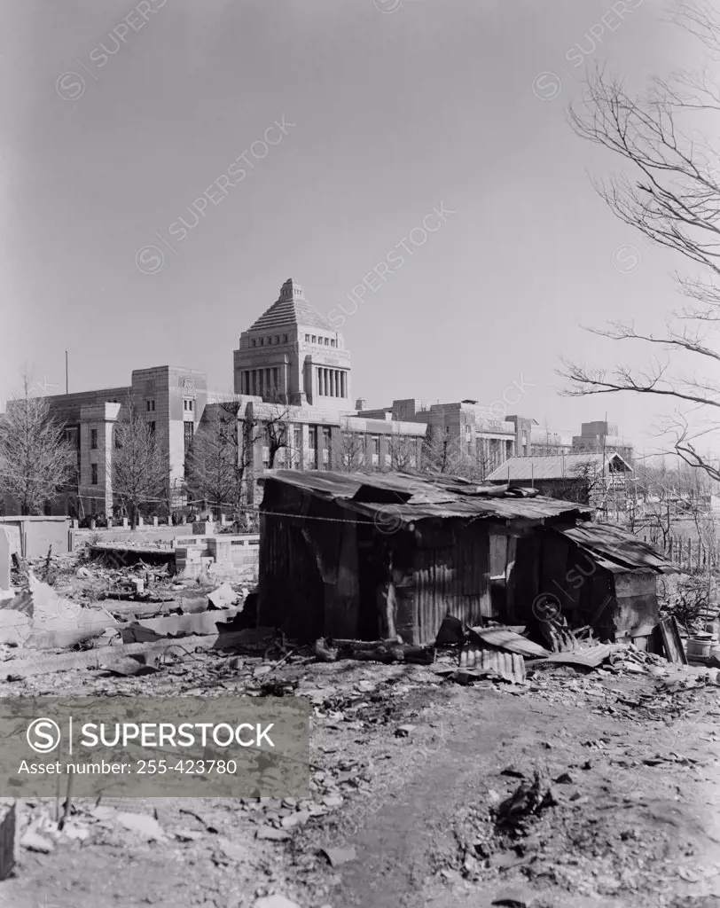 Japan, Tokyo, Slums with cityscape in background