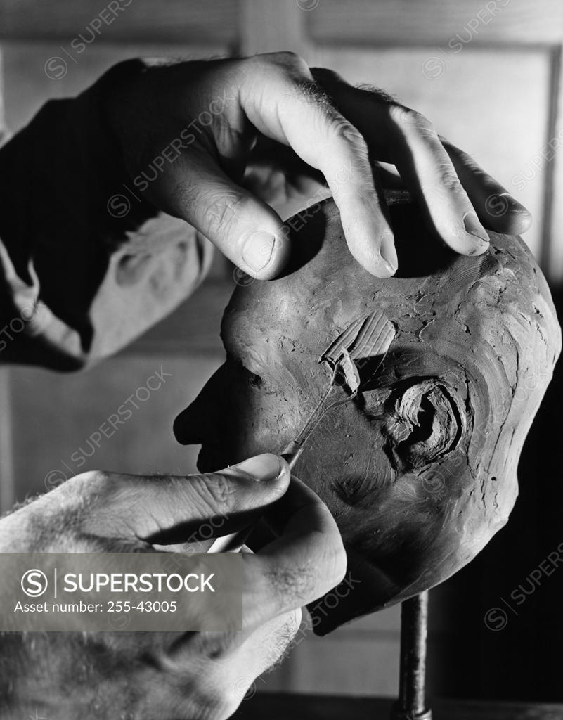 Close-Up Shot of a Person Molding Clay · Free Stock Photo