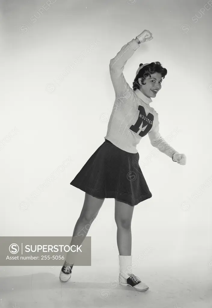 Vintage Photograph. Girl cheerleader posing. Frame 2