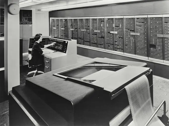 Vintage photograph. Faith Lillibridge working on the NORC, built by IBM, Most powerful computer in existence at the time.