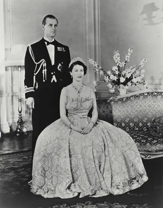 Vintage photograph. Her Royal Highness Princess Elizabeth and her husband His Royal Highness the Duke of Edinburgh at Clarence House, London, England