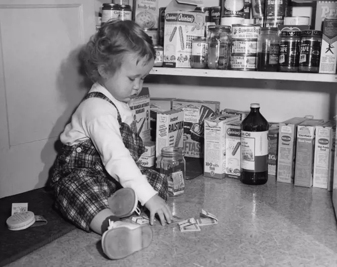 Little girl playing with matches