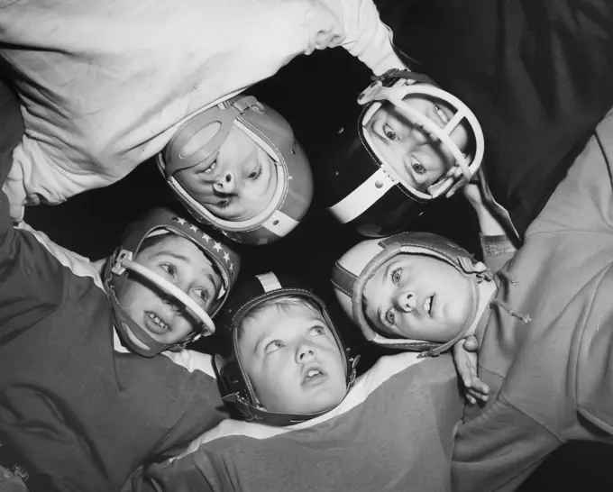 Football team in a huddle