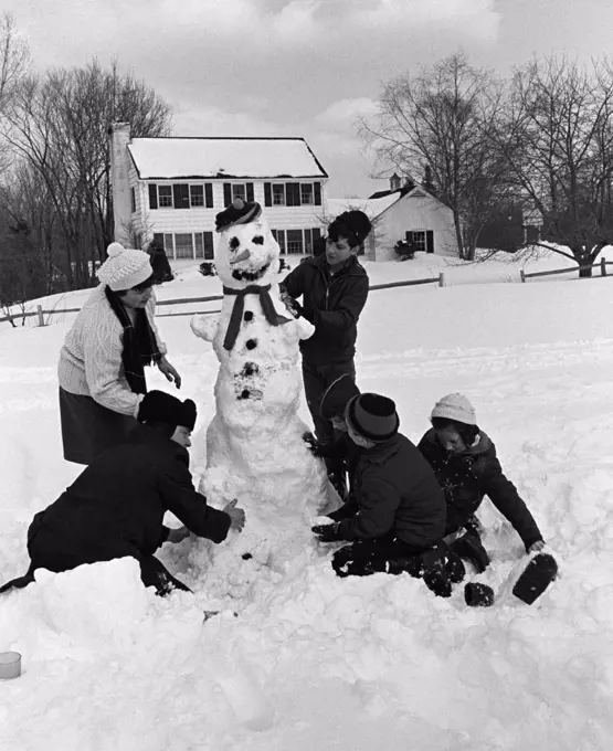 Children making snowman