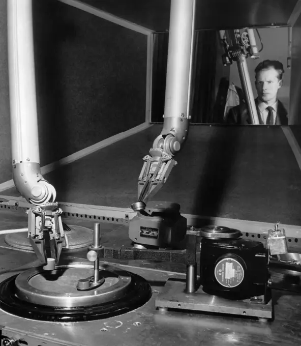 Scientist observing laboratory equipment in a metallurgy laboratory