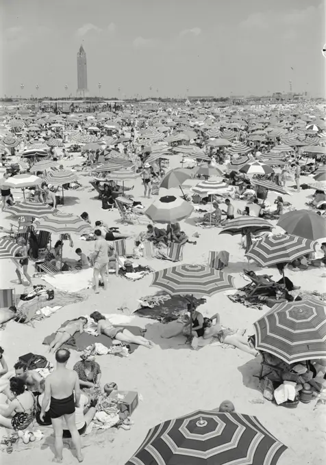 Vintage photograph. Crowded beach full of people at Jones Beach, Long Island