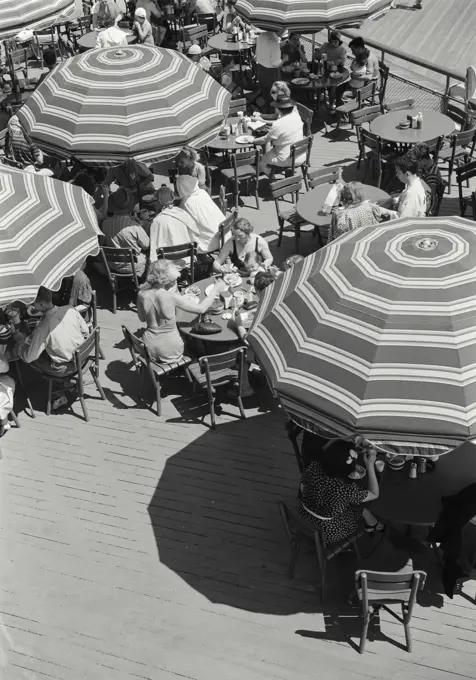 Vintage photograph. Crowded restaurant on boardwalk near Jones Beach, Long Island