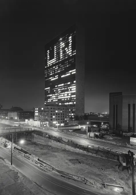 Vintage photograph. united nations building at night with UN in lights