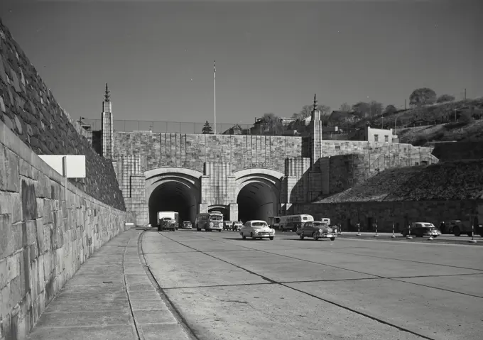 Vintage photograph. the lincoln tunnel plaza on the new jersey side with cars and trucks on road