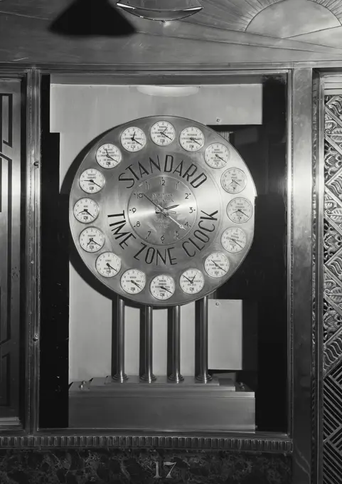 Vintage photograph. Standard time zone clock in the lobby of the N.Y. News Building