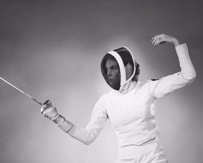 Young woman fencing