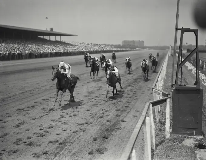 Vintage photograph. horse in lead at aqueduct race track