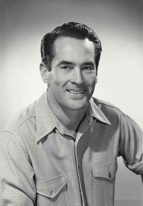 Vintage photograph. man in button shirt smiling at camera