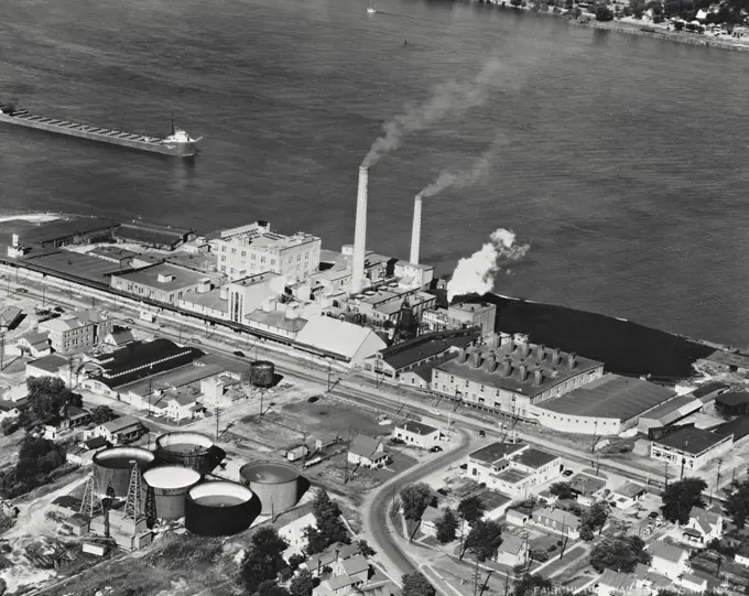 Vintage photograph. Aerial view of the Diamond Crystal-Colonial Salt Division plant of General Foods on the St Clair River with salt wells in left foreground