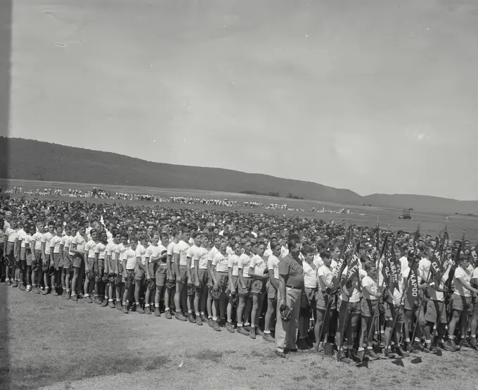 Vintage photograph. Mass meeting of camp members of Camp Penn, PA. State Camp, 2700 boys in group forming a keystone.