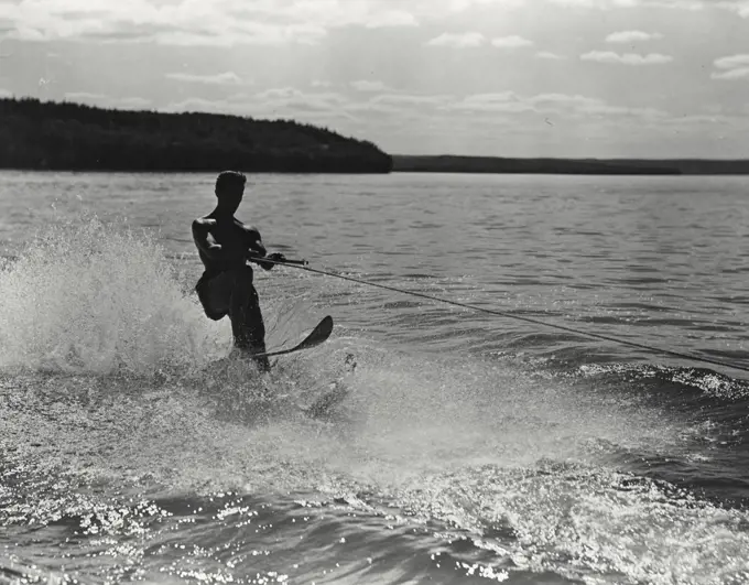 Vintage photograph. Water skiing on Lake Waskesiu in Prince Albert National Park, Saskatchewan, Canada