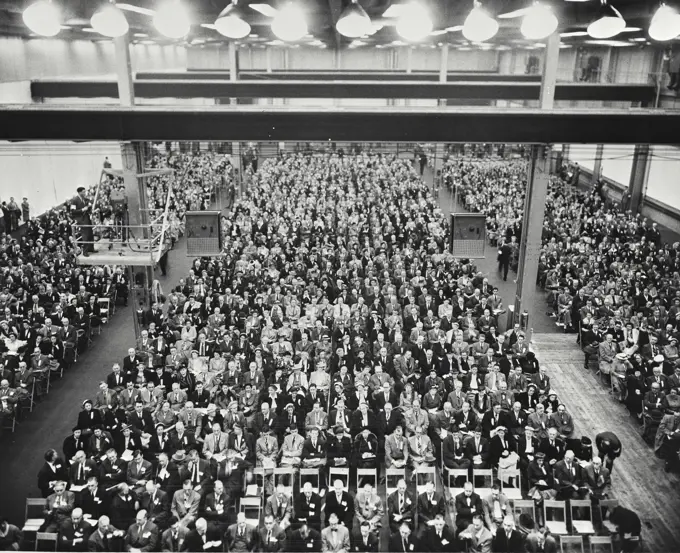 Vintage photograph. A record total of 2,200 General Electric Company share owners and guests attended the Company's 60th annual meeting. The share owners came from nearly all of the 48 states and from Canada