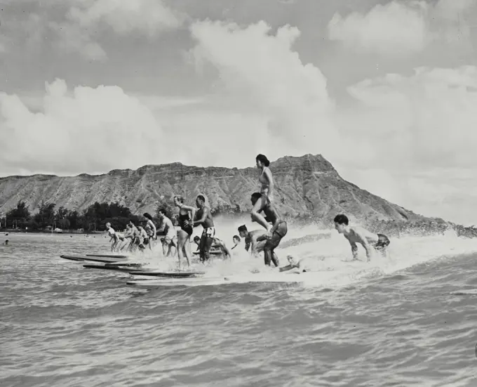 Vintage photograph. Surfboard riders at Waikiki Beach, Hawaii