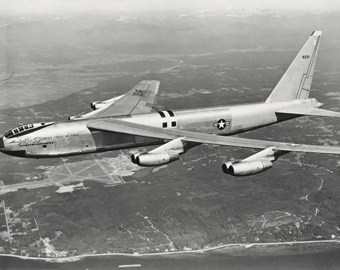 Vintage photograph. The Boeing YB-52 Stratofortress in flight, Wing span is 185 feet, length is 153 feet