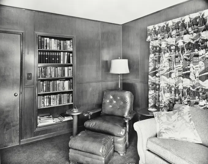 Vintage photograph. Interior of home library with Natural Walnut Marlite wood panels