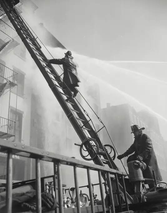 Vintage photograph. Five-alarm fire that raged through a five story export warehouse