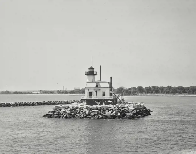 Vintage photograph. Lighthouse on breakwater at entrance to Bridgeport, Connecticut