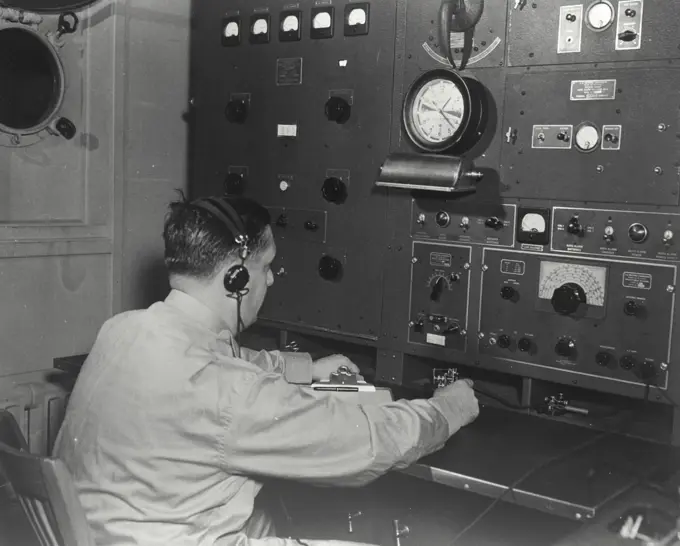 Vintage photograph. Radio check on liberty ship