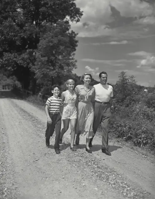 Vintage photograph. Family on country road