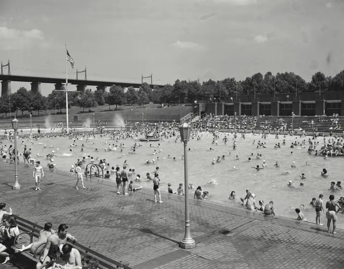 Vintage photograph. Astoria Park Pool. New York City. People playing in public pool