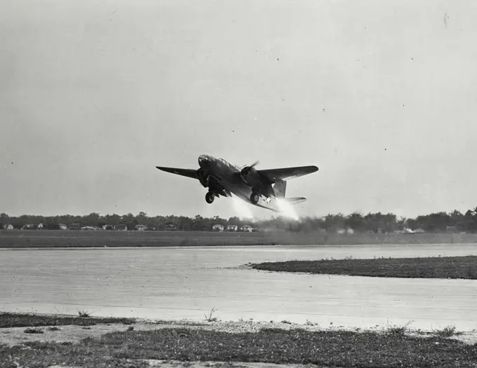 Vintage photograph. A-20, equipped with rockets to shorten takeoff run at Wright field