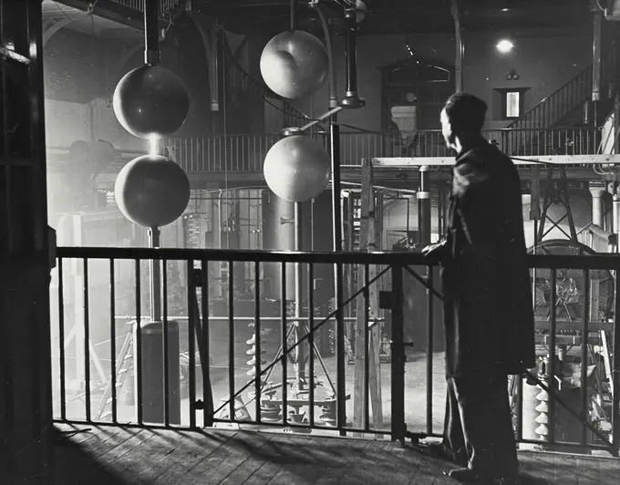 Vintage photograph. A general view of the laboratory, showing the 75 cm sphere gap on the left and the 100 cm sphere gap on the right.