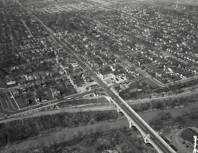 Aerial view of Richmond, Indiana with the Main Street bridge on Route US 40 over the Whitewater gorge. Large building is Richmond Bottling Company which is a Coca Cola distributor