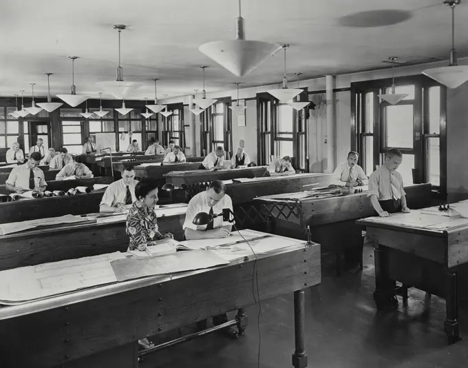 Vintage photograph. Employees seen in one of the drafting rooms of the Shawinigan Engineering Company