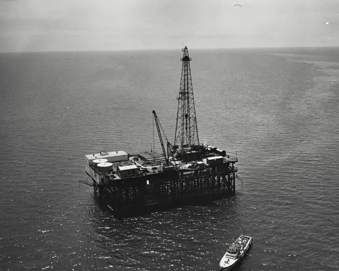 Vintage photograph. Humble Oil & Refining Co. off-shore drilling rig.