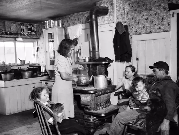 Parents and their children in the kitchen