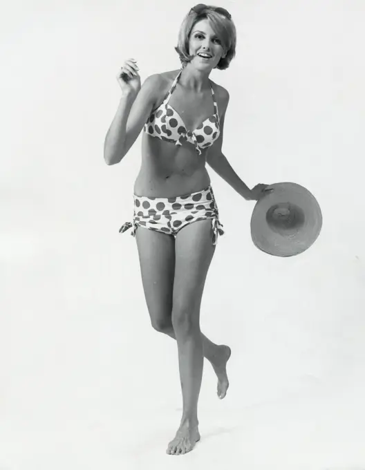 Girl in bikini with hat