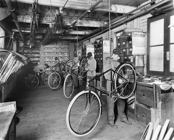 Workers working in a bicycle factory