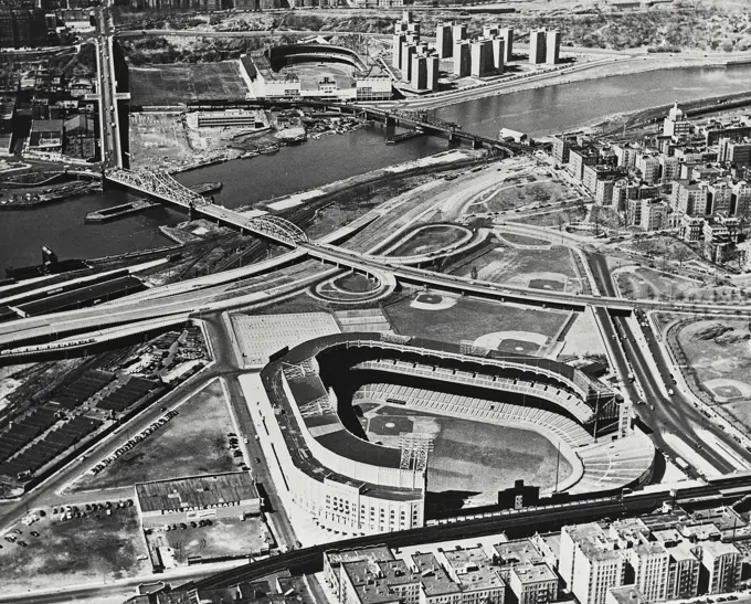 Vintage Photograph. Aerial view of Yankee Stadium in foreground and the Polo Grounds in background across the Harlem River, New York City