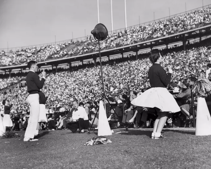 Cheerleaders performing in a stadium