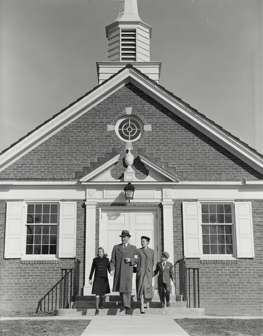 Vintage Photograph. Well dressed family of four walking away from steps of small church Frame 1