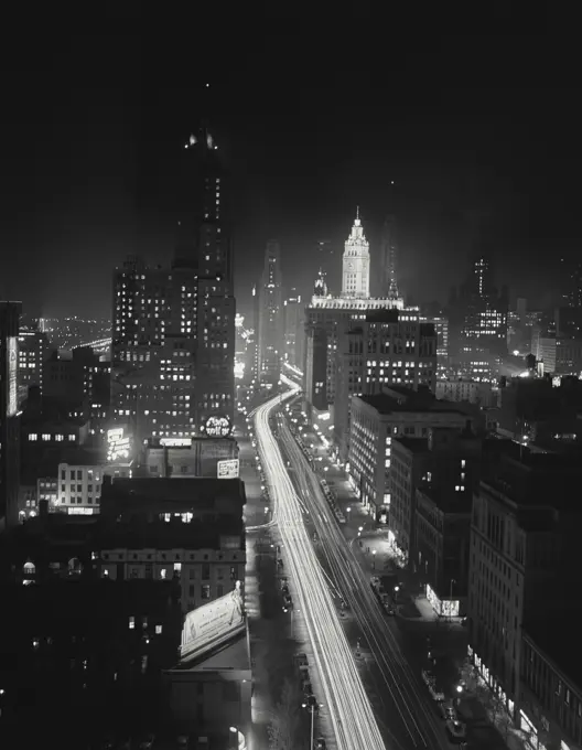 Vintage Photograph. Night view of Michigan Avenue north of the Chicago River, looking south. Chicago, Illinois