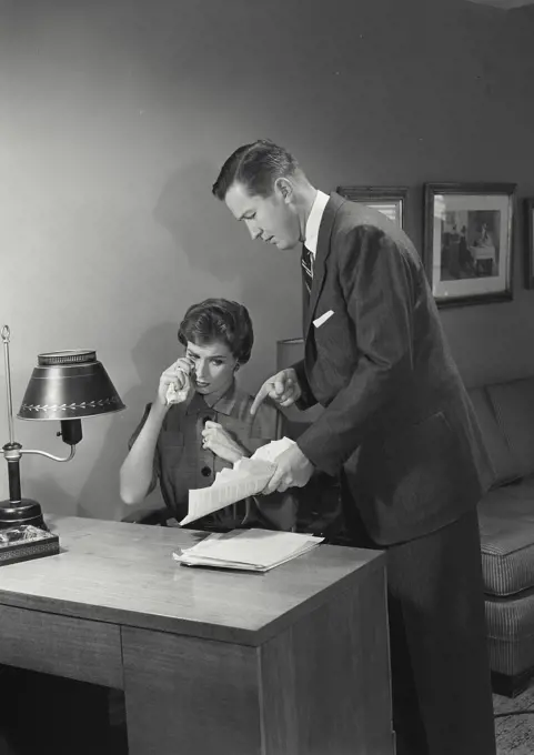 Vintage Photograph. Byron Carlson. Jane Carlson. Models Released. Husband arguing with wife over bills.