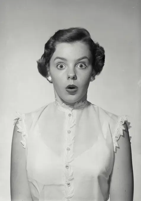 Vintage Photograph. Woman in sleeveless blouse smiling wide. Frame 4