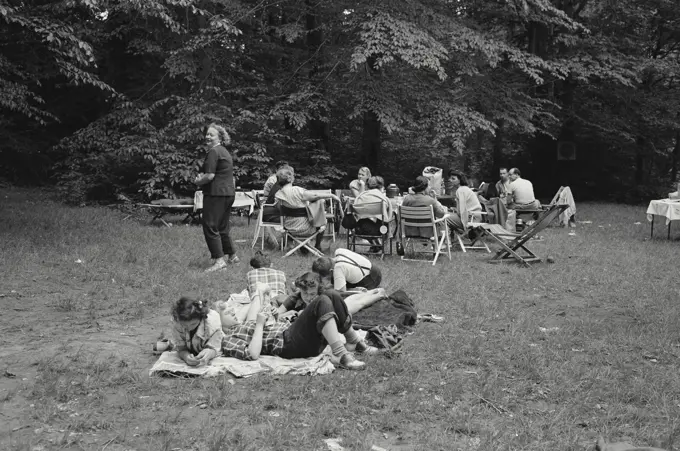 Vintage Photograph. Family picnic in field