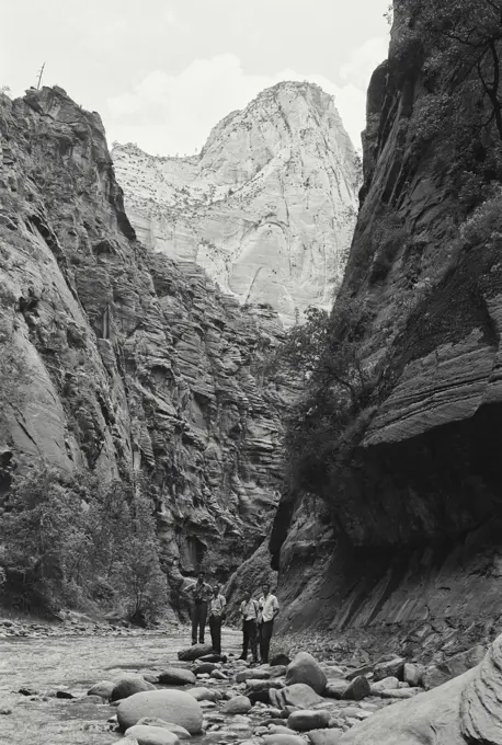 Vintage Photograph. People standing in the Mountain of Mystery.