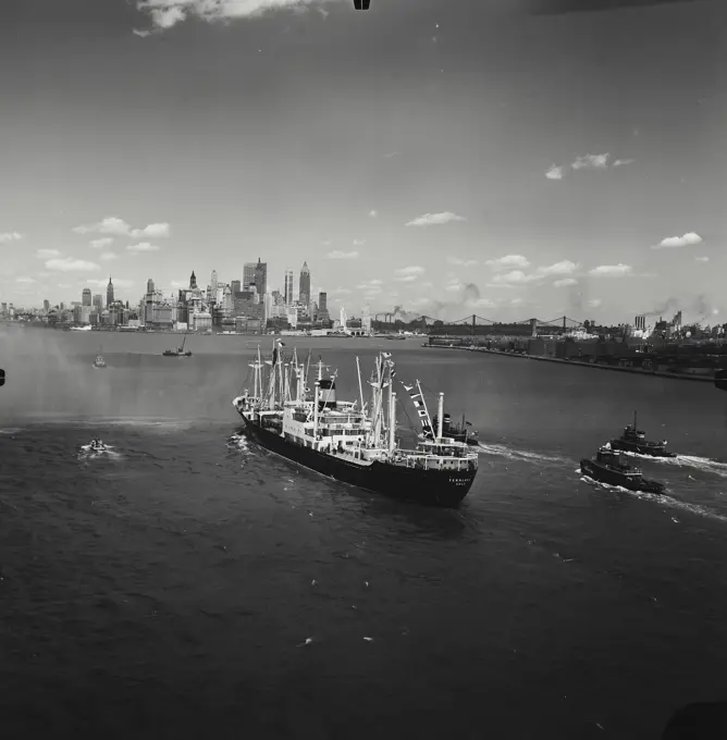 Vintage Photograph. Freighter "Fernlake" arrives in New York, approaching Manhattan, New York City